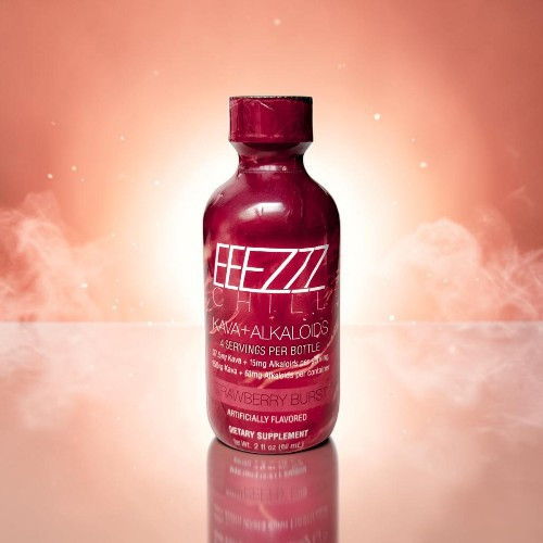 Bottle of hair supplement against a soft, glowing background.