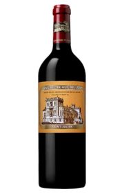 Red wine bottle with a decorative label featuring a building illustration.