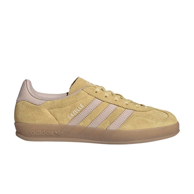 Yellow suede sneakers with three stripes and a gum sole.
