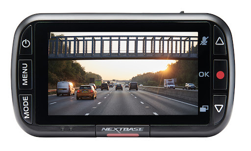 GPS device displaying a highway scene with vehicles and a bridge.