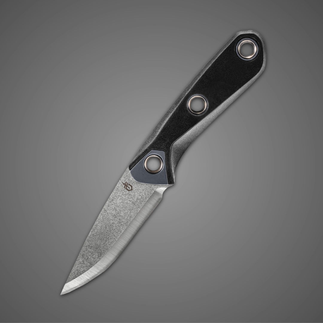 A knife with a black handle on a gray background.
