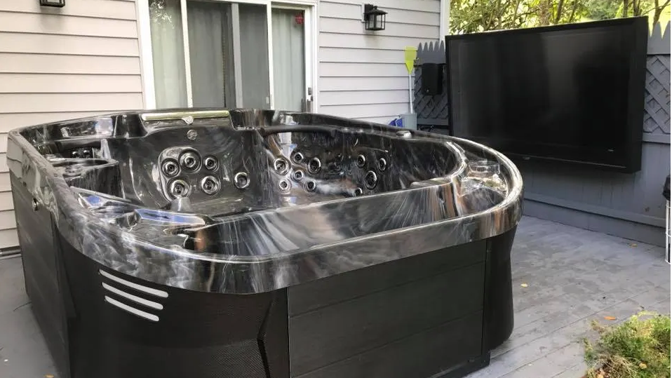 Outdoor TV by hot tub The TV Shield PRO