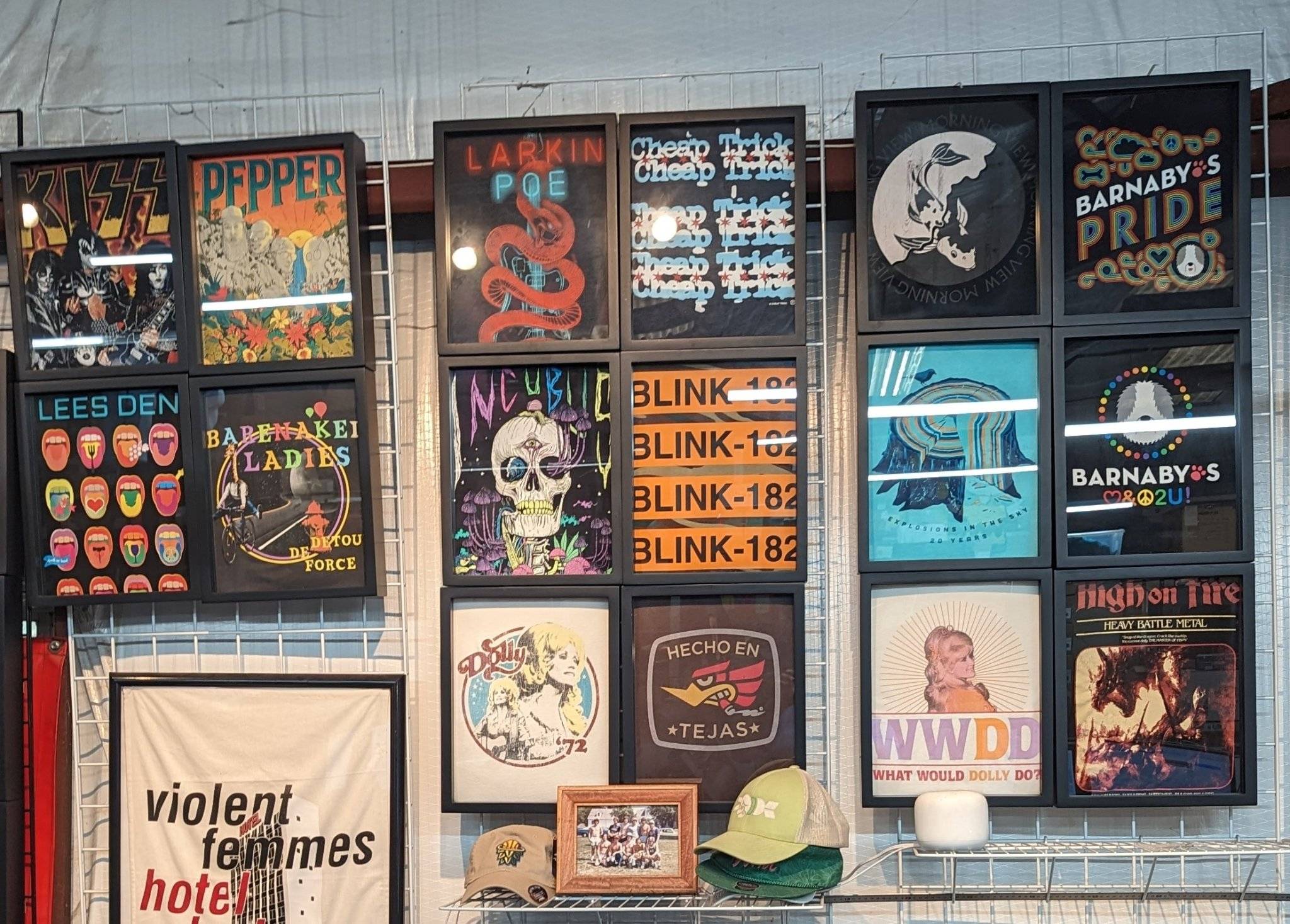 TNT Shirts screen printing tee shirt display  featuring their tee shirts  displayed  in Shart Orignal T-Shirt Frames