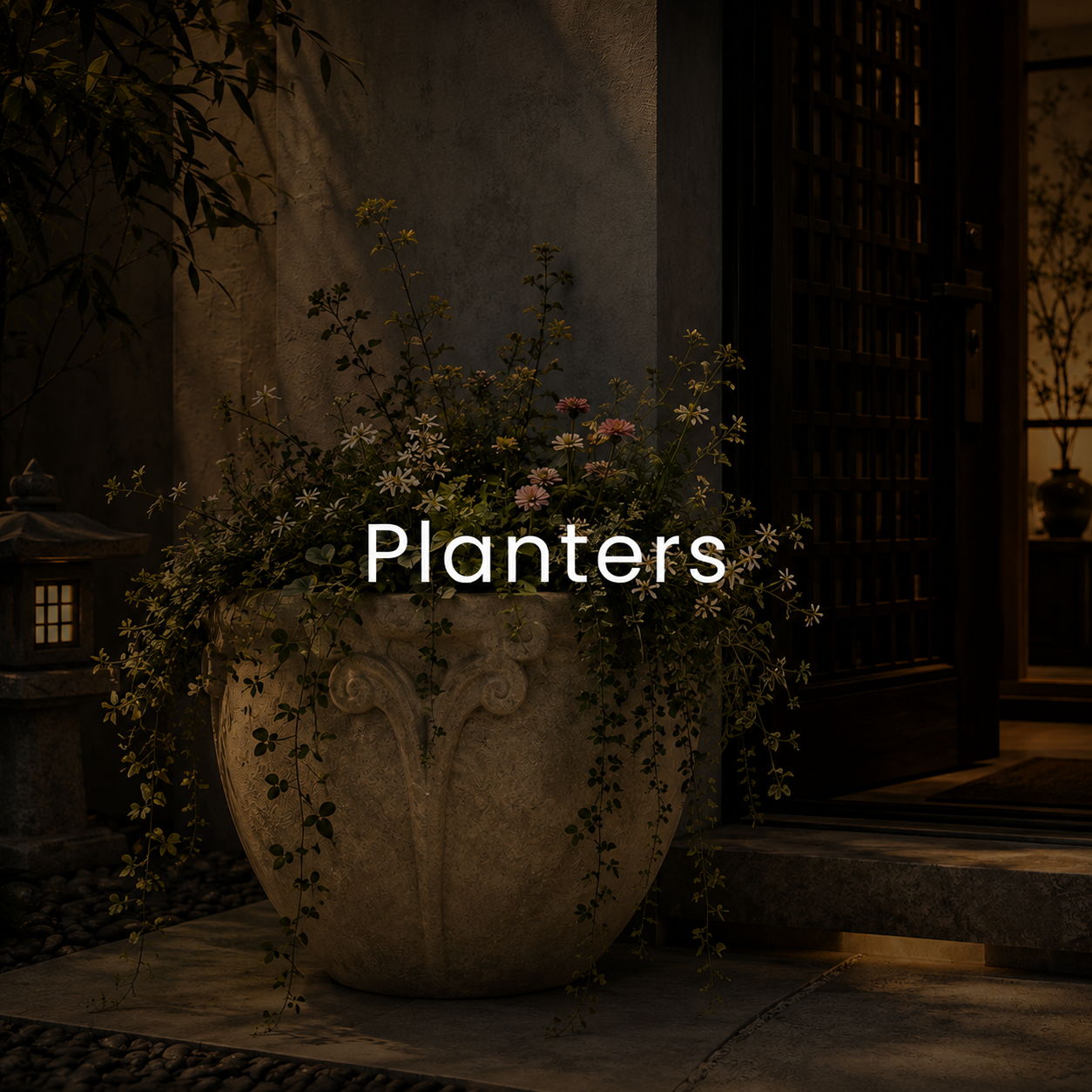 A decorative planter with plants in a dimly lit setting.