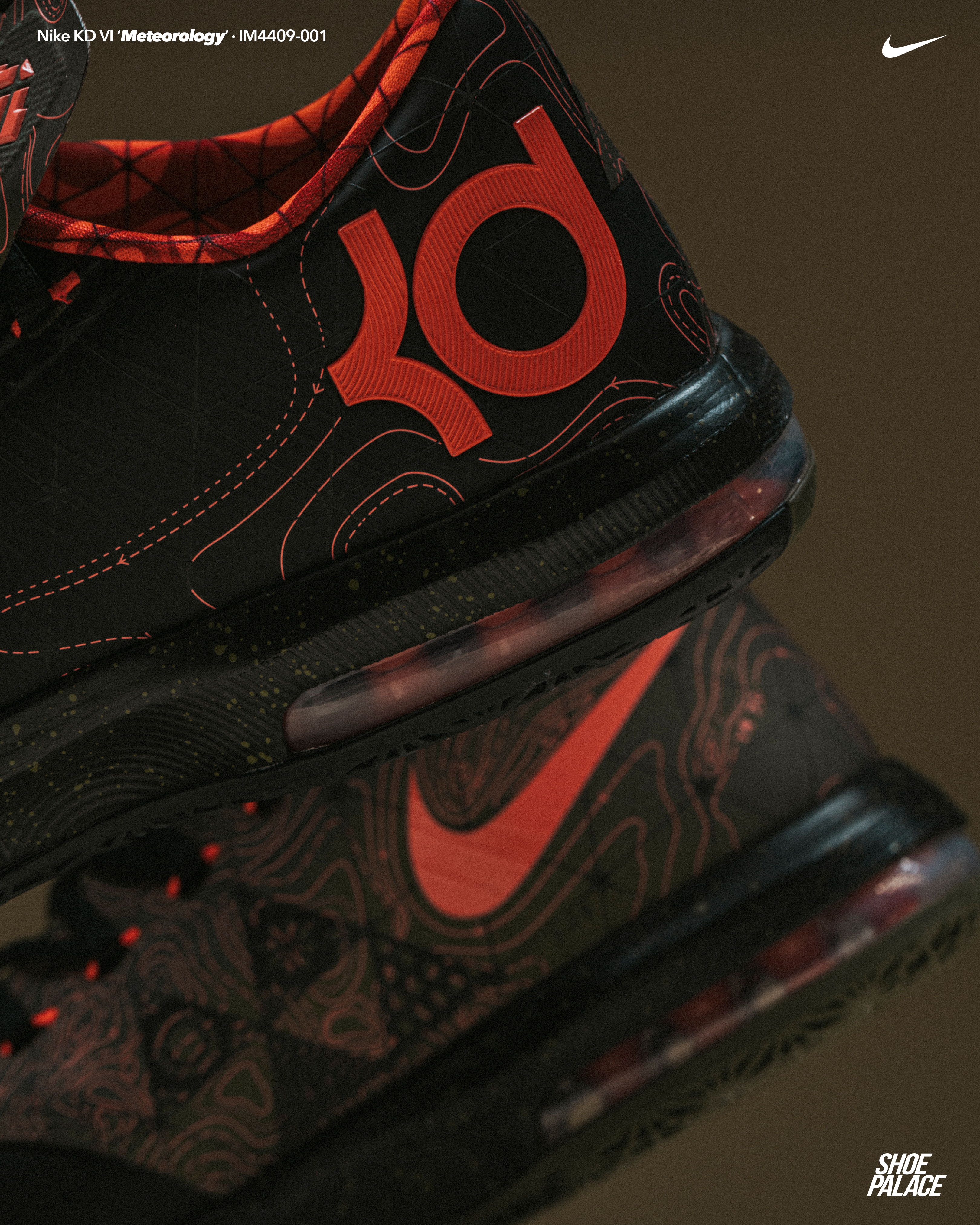 Close-up of black and red Nike KD sneakers.