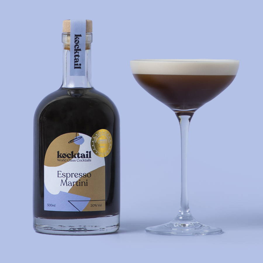 Espresso Martini bottle and cocktail on blue background