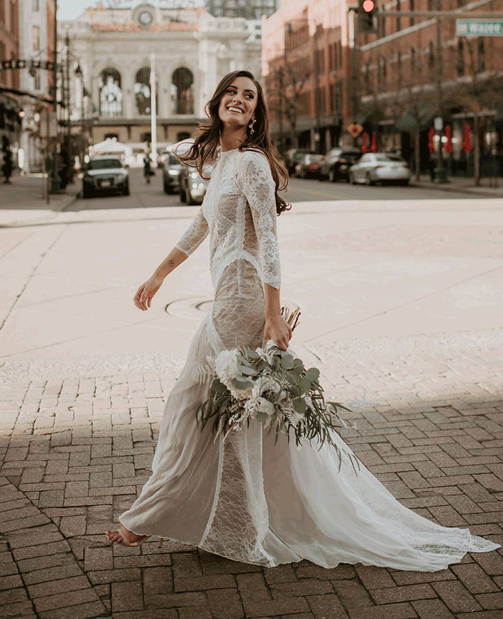 Grace Loves Lace bride wearing the Inca wedding dress walking the streets in USA
