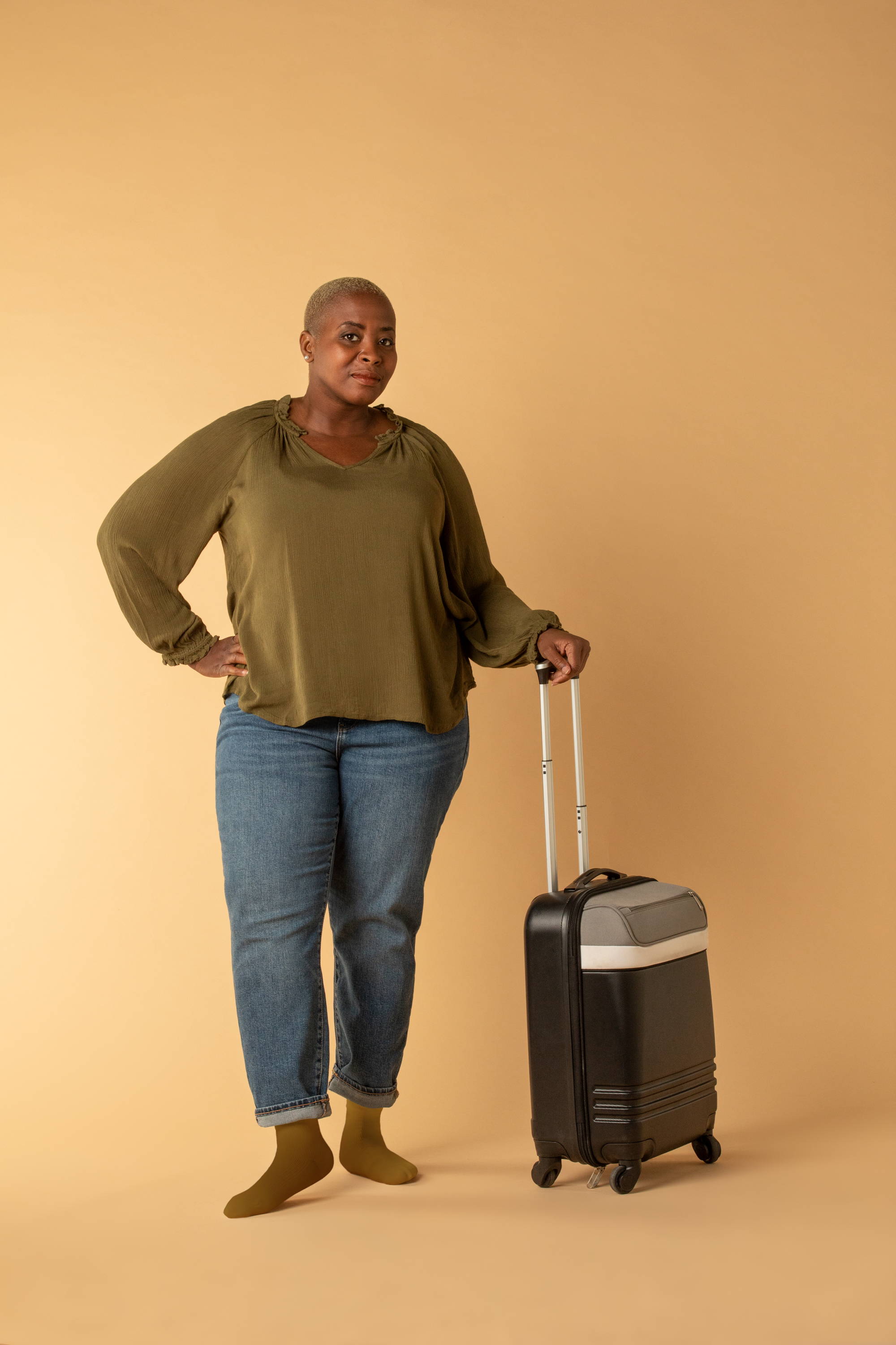 Woman with luggage, woman wearing compression socks, woman wearing EAse compression socks