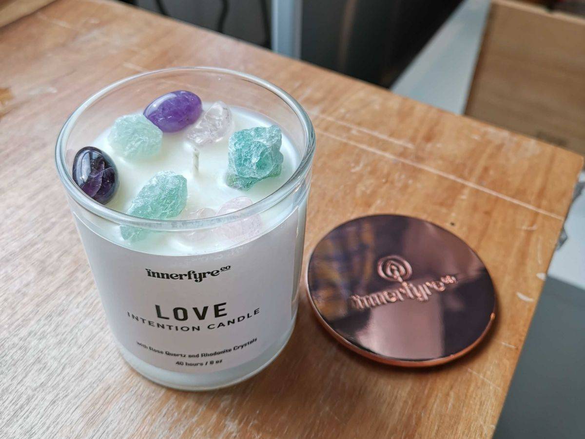 scented candle with aventurine and amethyst crystals