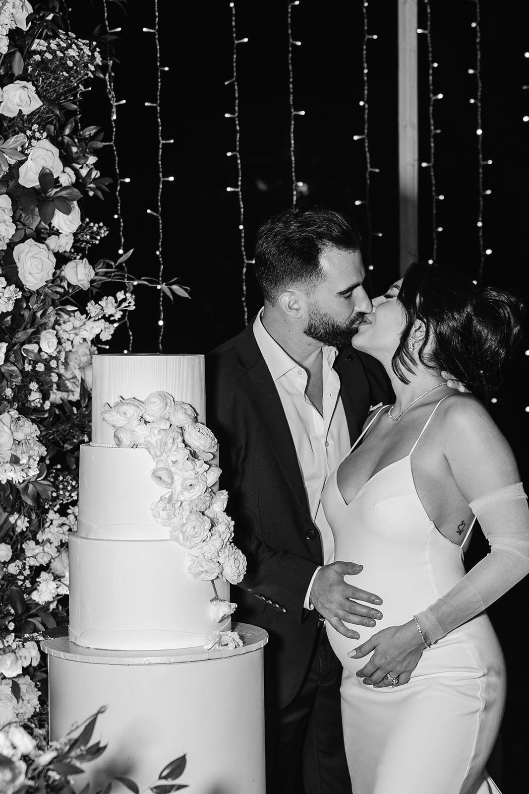 Bride and Groom sharing a kiss