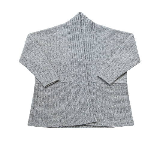 A hand knit textured cardigan A hand knit long-sleeved turtleneck sweater photographed flat on a white background