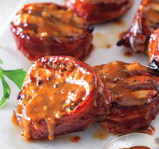 Saucy Bacon Wrapped Pork Tenderloins – see more on our Instagram