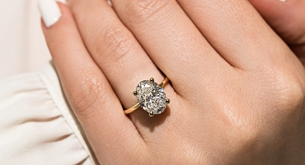 Solitaire engagement ring with large oval cut 3ct lab grown diamond in 14k yellow gold