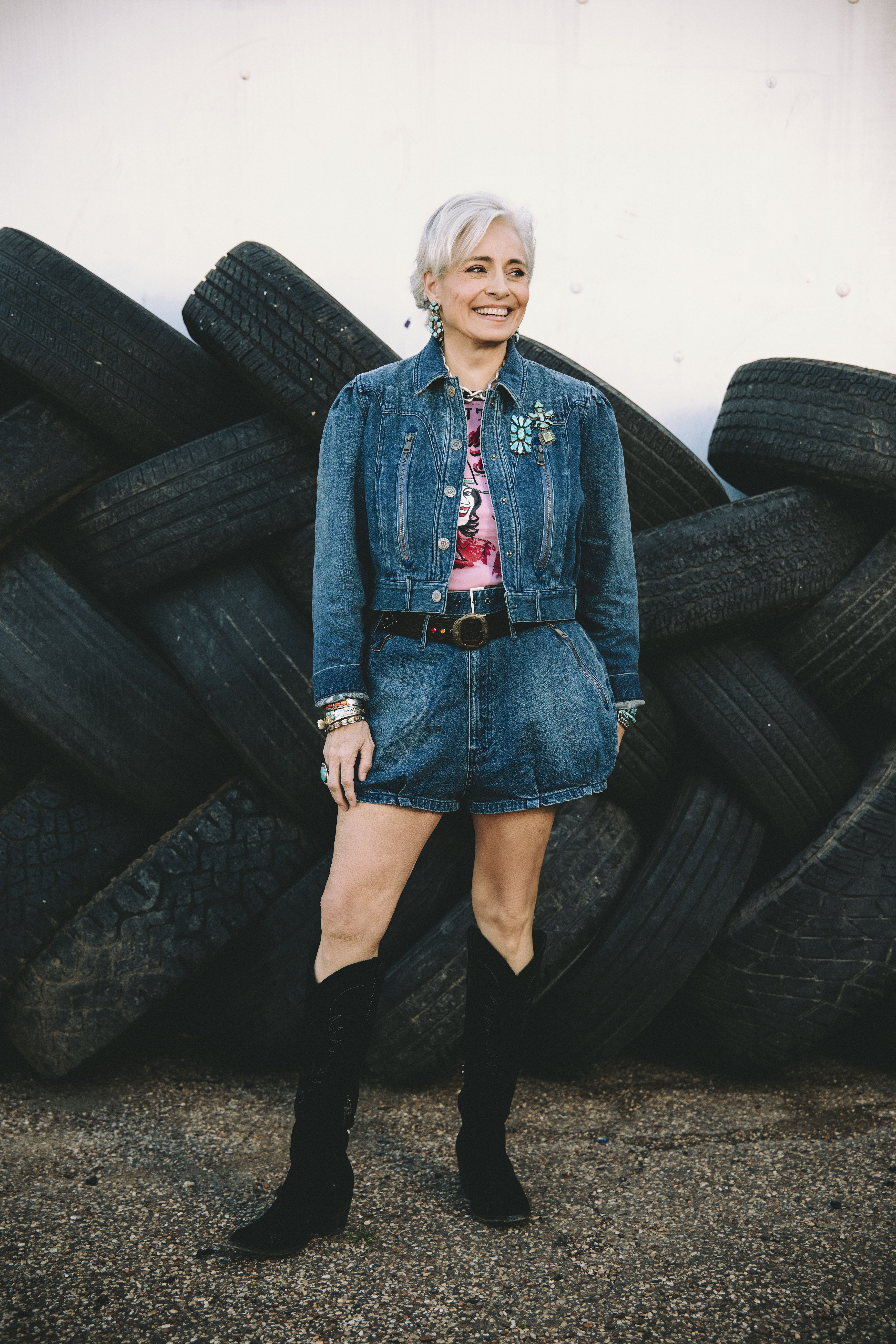 Hedy wearing the Spur Line Jacket, Short, Barbed Wire Baby tee, Double D Ranch jewelry and accessories with her Long Tall Sally boots in black.