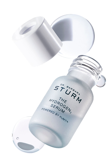 A glass serum bottle with a white cap, labeled 