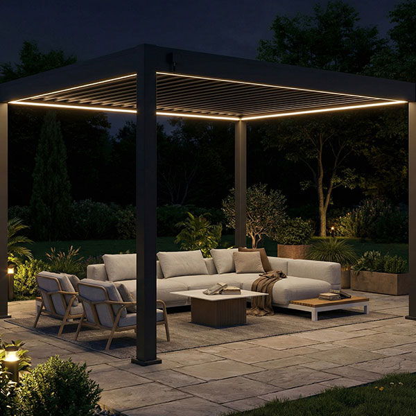 Modern outdoor seating area with soft lighting at night.
