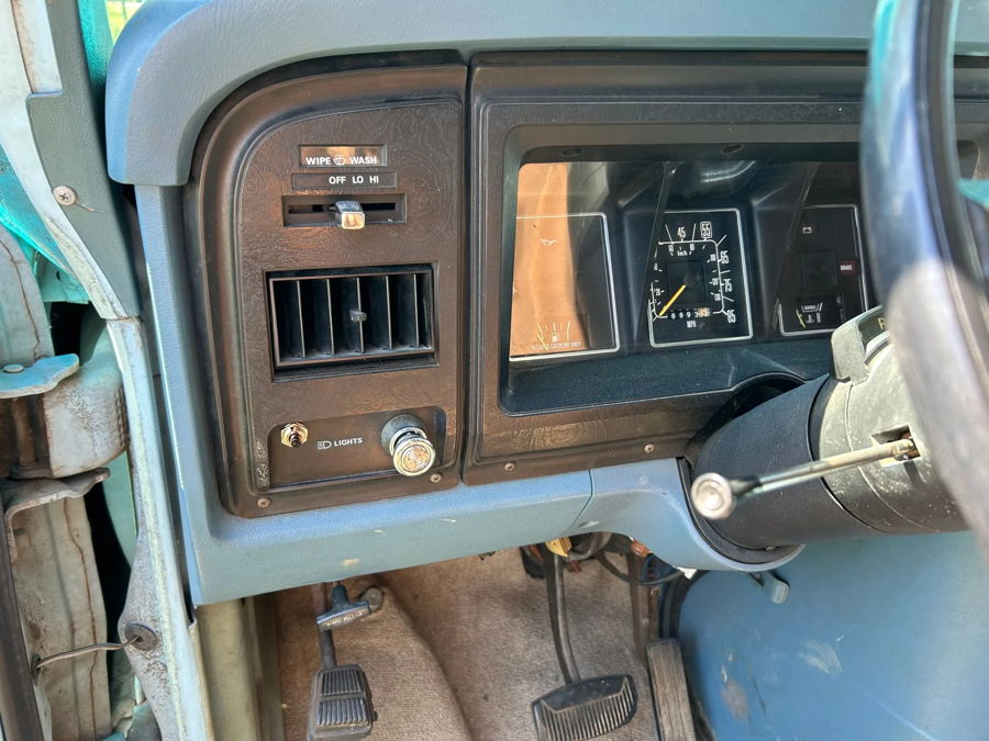 Light blue dashboard speedometer fuel gauge aftermarket toggle switch pedals brake release Blake's 1982 Ford Econoline Dixie gallery photo 4