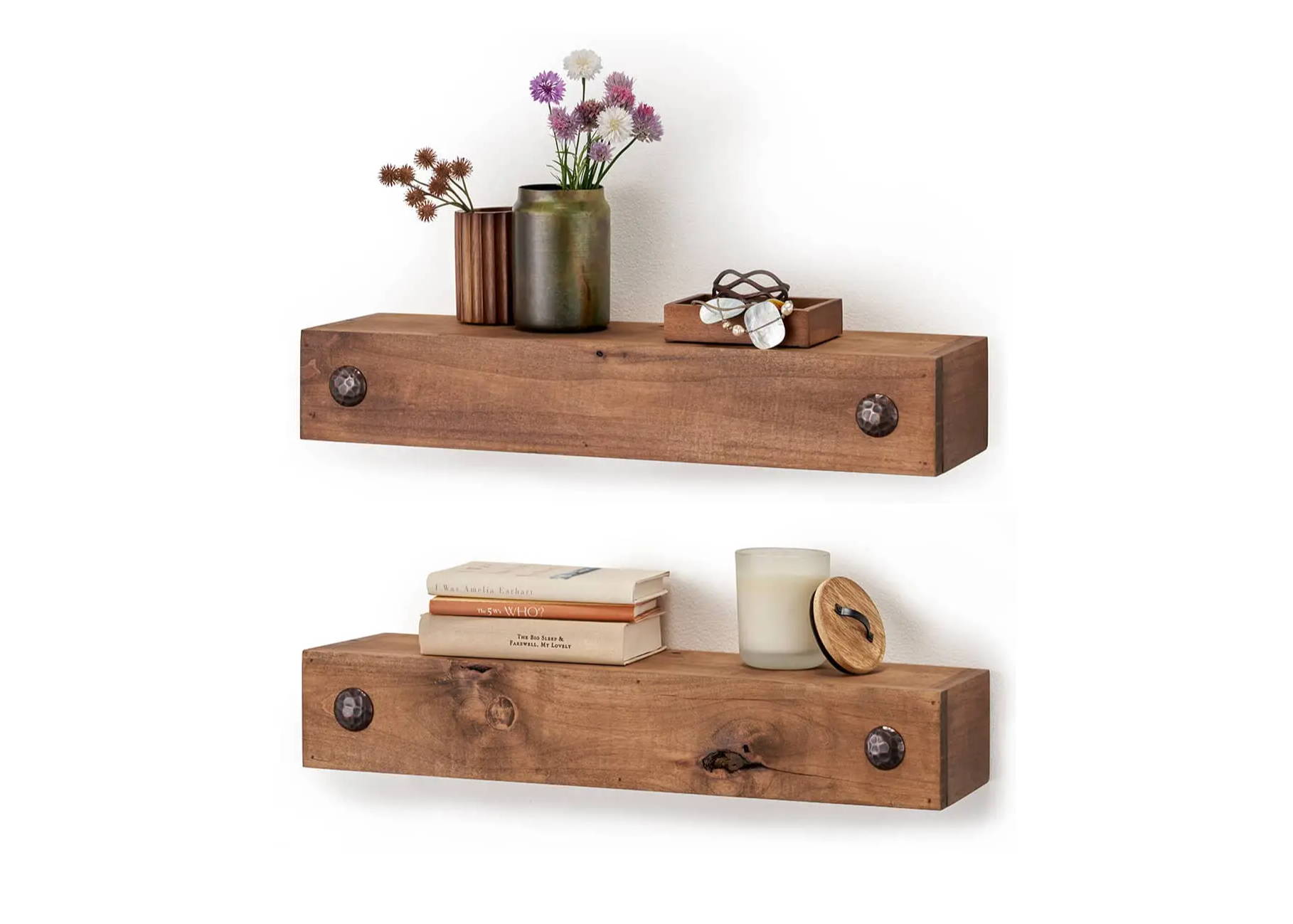 wood floating wall shelves filled with living room accents and trinkets