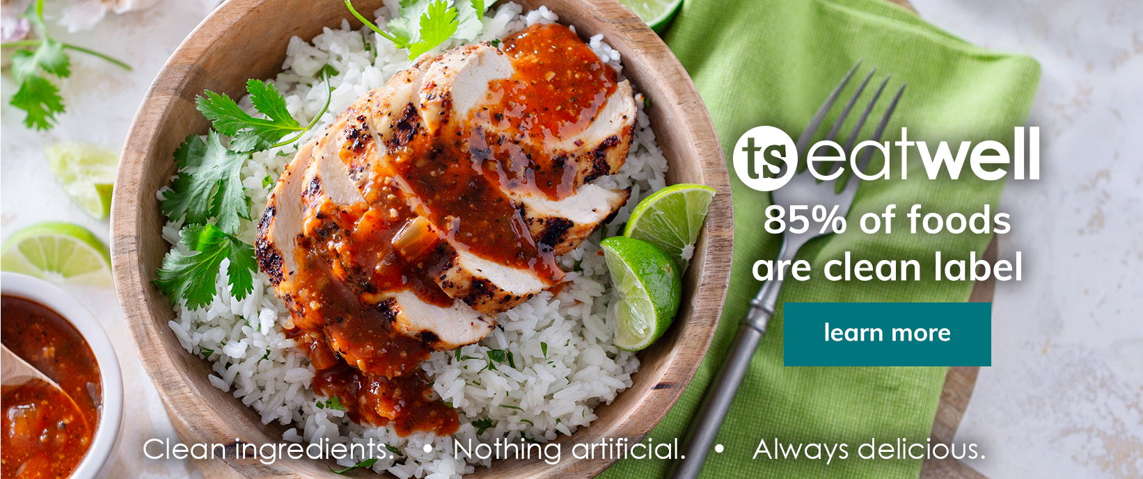 ts eatwell banner featuring a rice bowl and pork with a learn more button