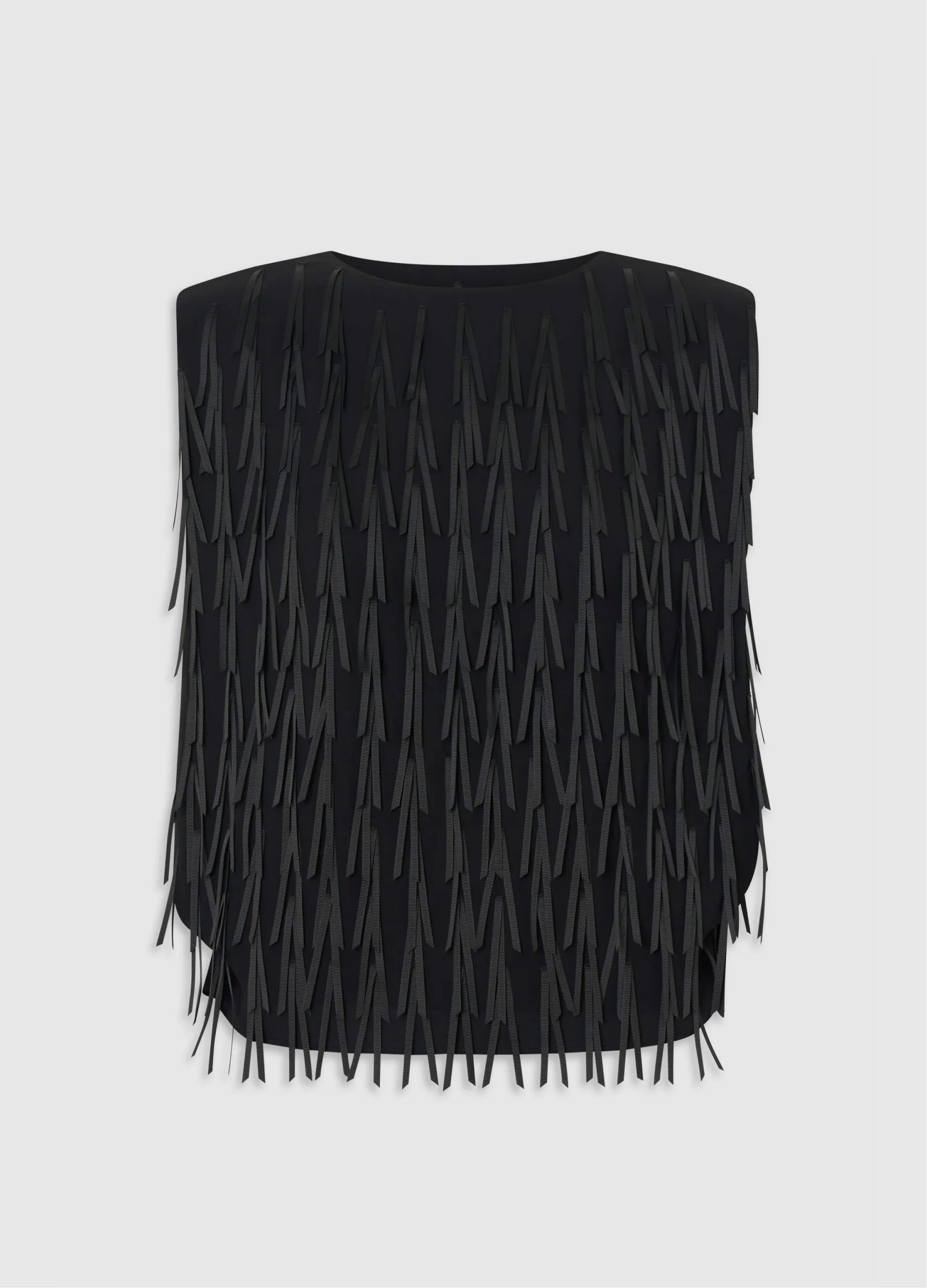 Black vest with fringe detailing on the front.