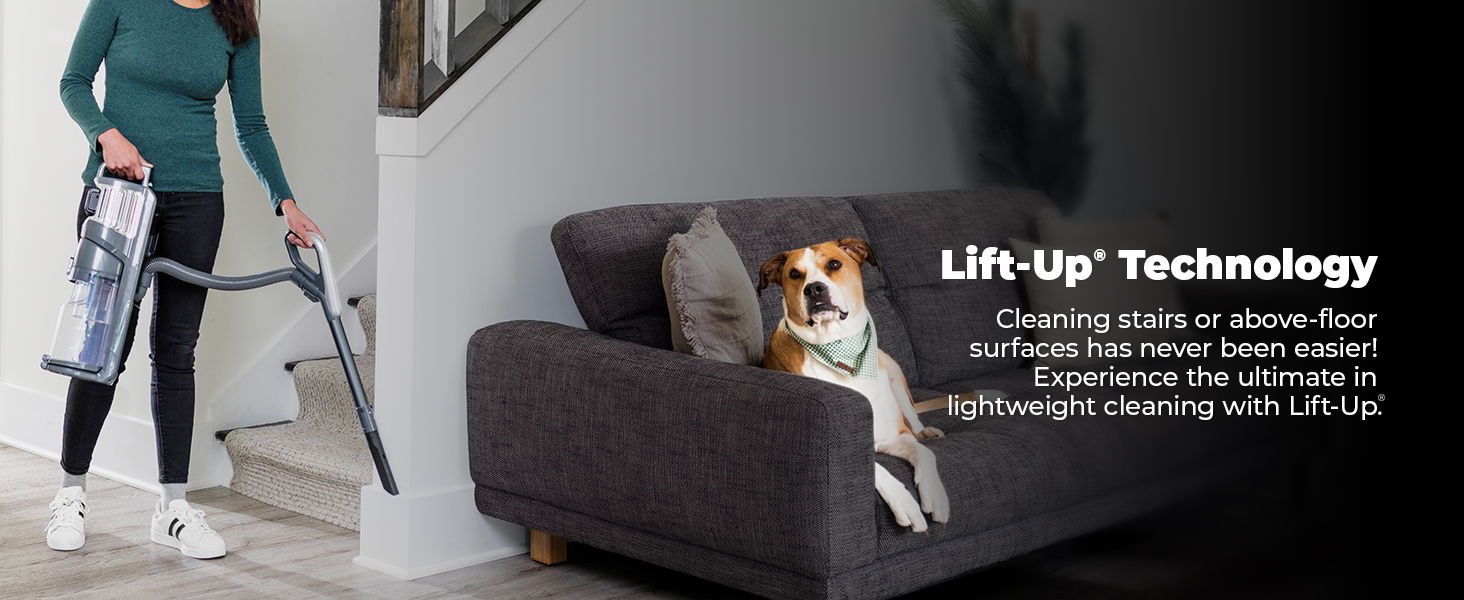 Woman vacuuming stairs beside a dog on a couch, promoting lift-up technology.