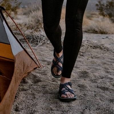 Woman camping wearing Siena Sport Sandals by Viakix 