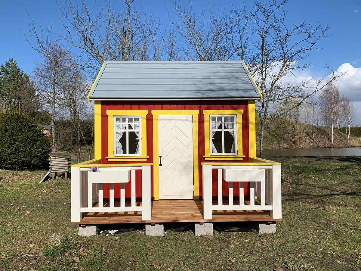 Red Wooden Playhouse with white flower boxes and yellow trims by WholeWoodPlayhouses