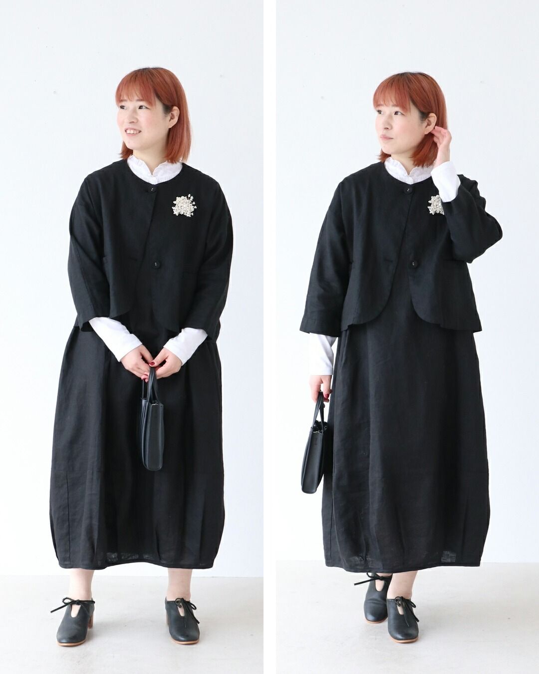 Woman in black dress and jacket, posing against a white background.