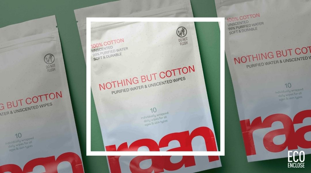 Three packages of cotton products on a green background.