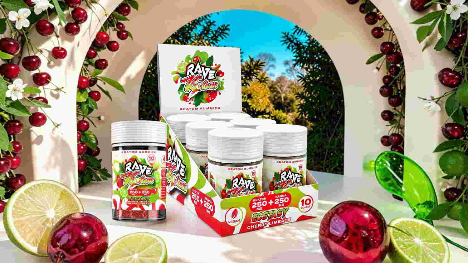 Product display of jars surrounded by fruits and greenery.
