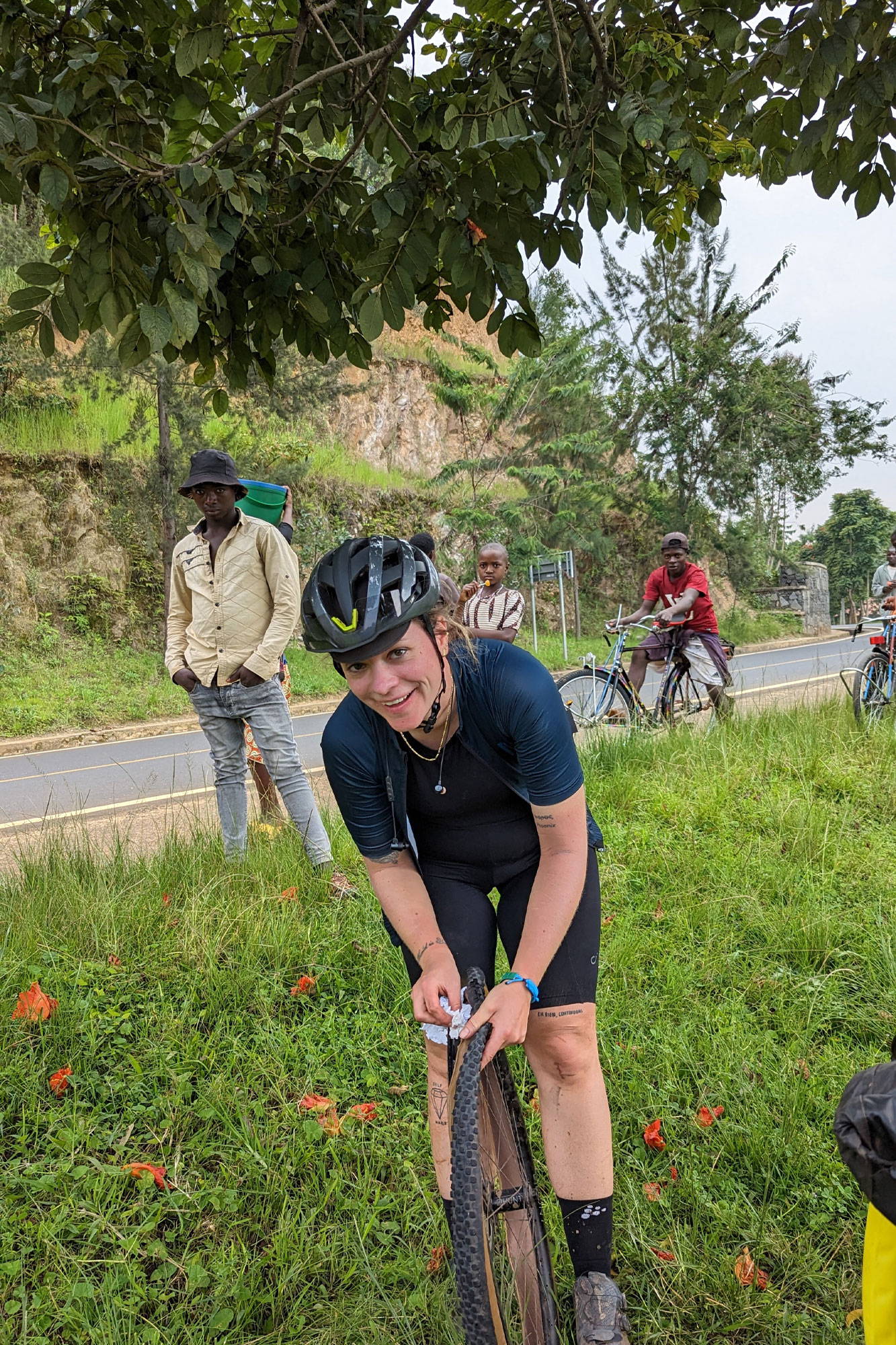 Lisa fixing a puncture at the side of the road