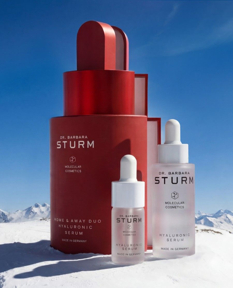 Three skincare products by Dr. Barbara Sturm on a snowy background.