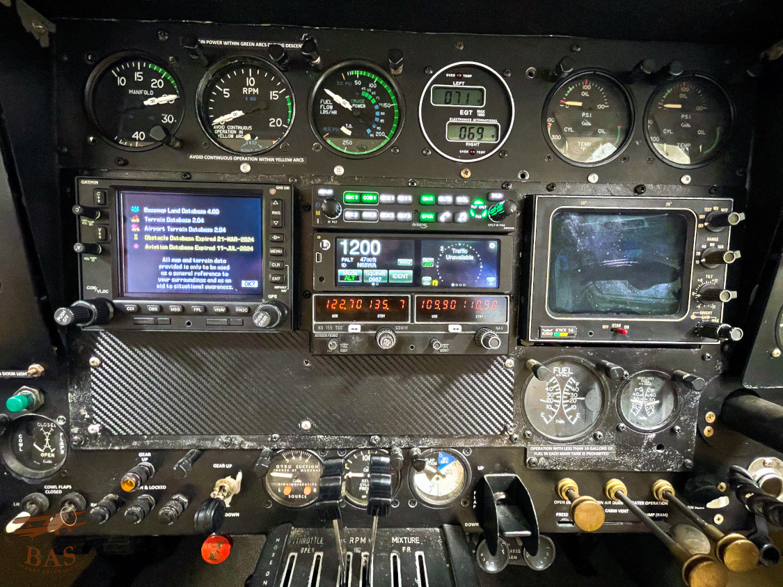 Avionics panel with lit Garmin stack