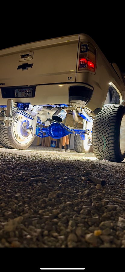 Side profile or angled exterior of Ethan's 2014 Chevy Silverado 1500 showing half-ton truck lines and Outlaw train horn install context, gallery photo 2