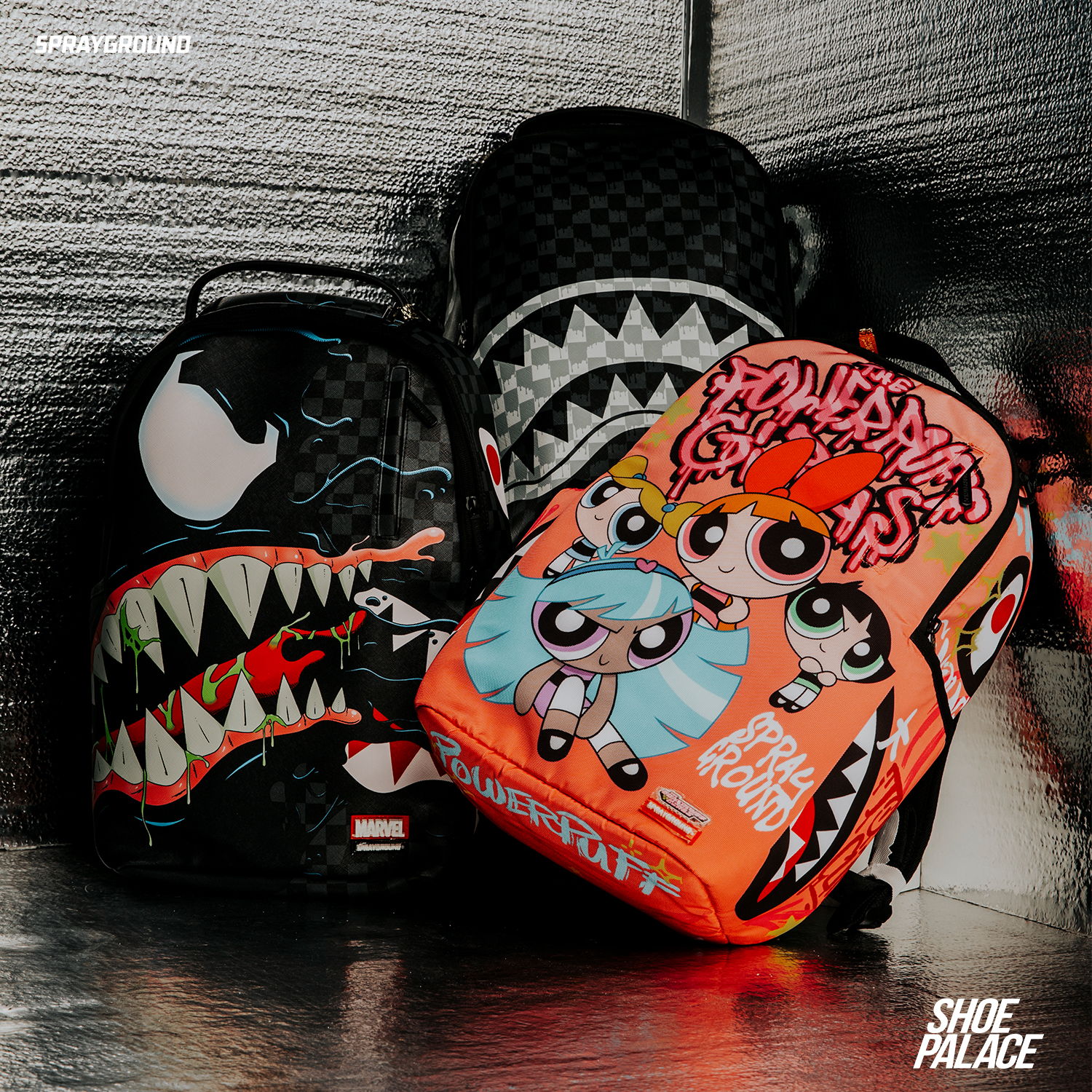 Colorful backpacks with cartoon characters and monster designs.