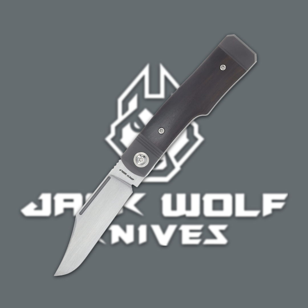 A folding knife with a black handle on a gray background.