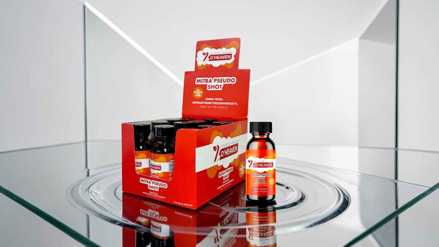 Box of health supplements with a single bottle displayed on a glass surface.