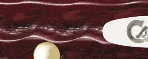 Abstract design with a pearl on a textured background.
