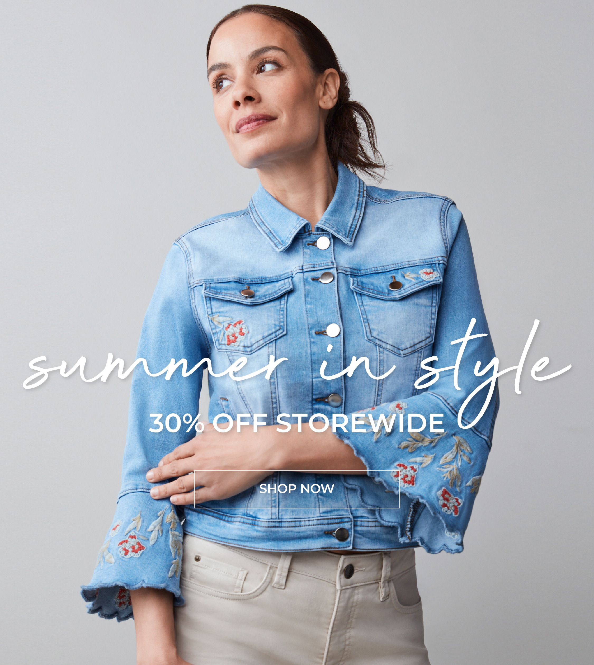 A woman in a denim jacket promoting a summer sale.