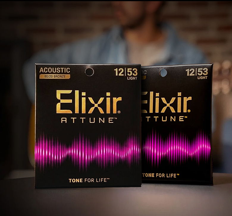 Two packages of Elixir Attune acoustic guitar strings.