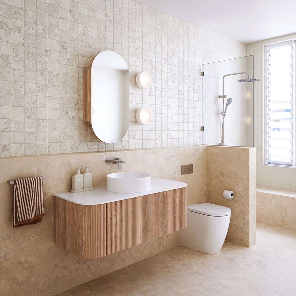 Modern bathroom interior with wooden accents and natural stone tiles.