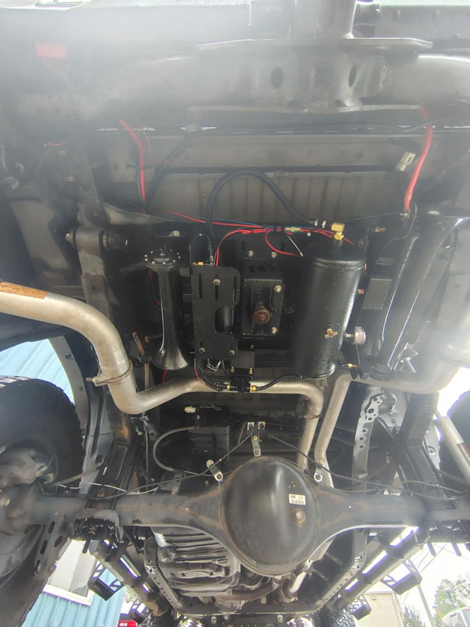 Undercarriage train horns compressor air tank pressure gauge wiring blue air lines exhaust rear axle Christie's Toyota Tundra Stealth Spare Tire Delete gallery photo 4