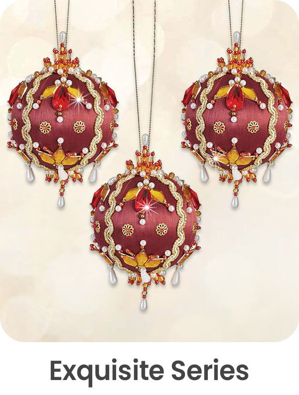 Three ornate decorative ornaments from the Exquisite Series.