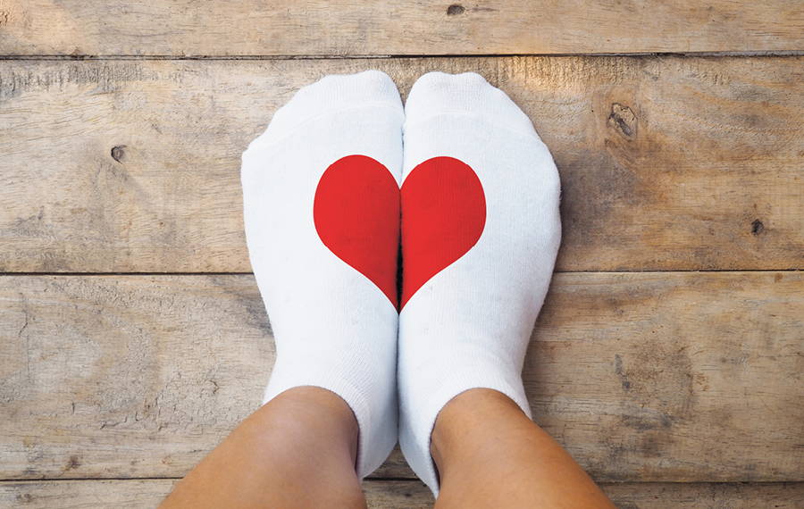 feet on floor with heart socks