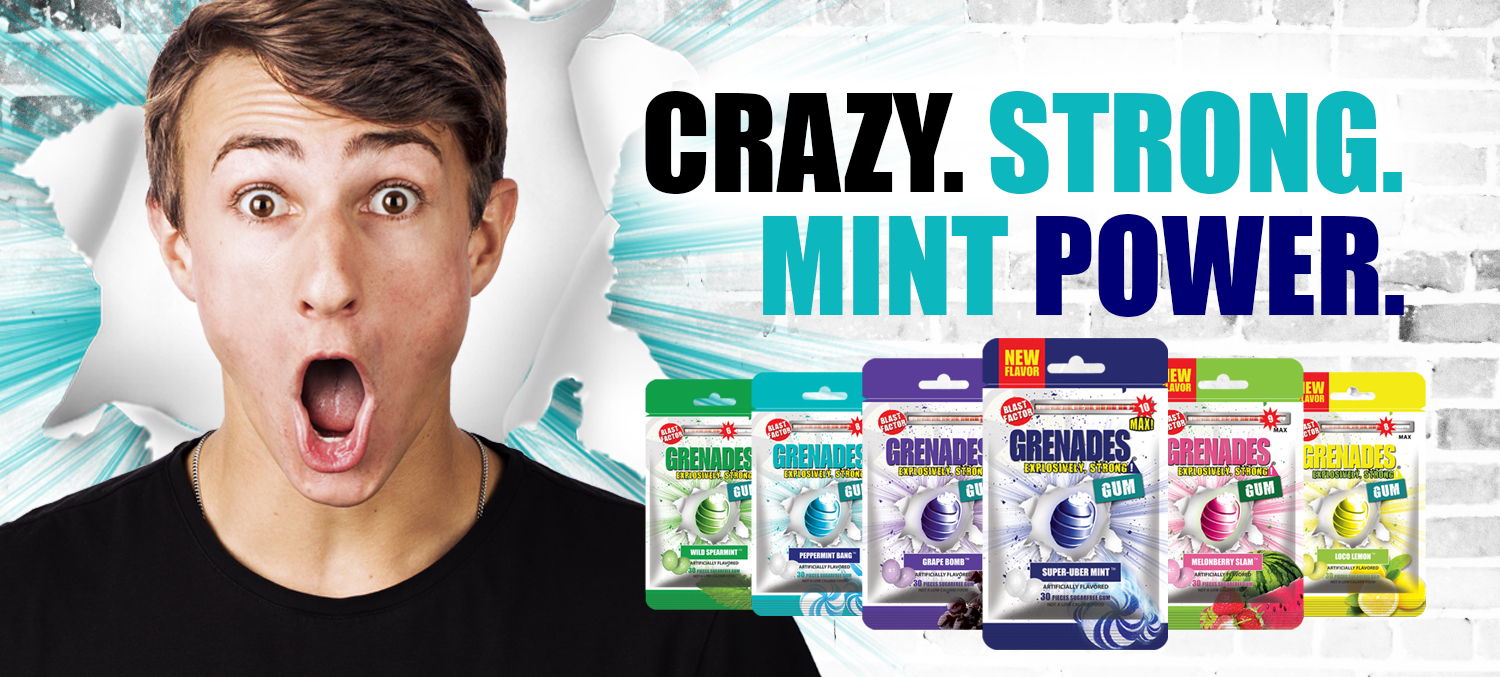 A man with his mouth open looking shocked with six bags of Grenades Gum stacked to his right of various flavors. There is text Crazy Strong Mint Power in bold black and blue lettering