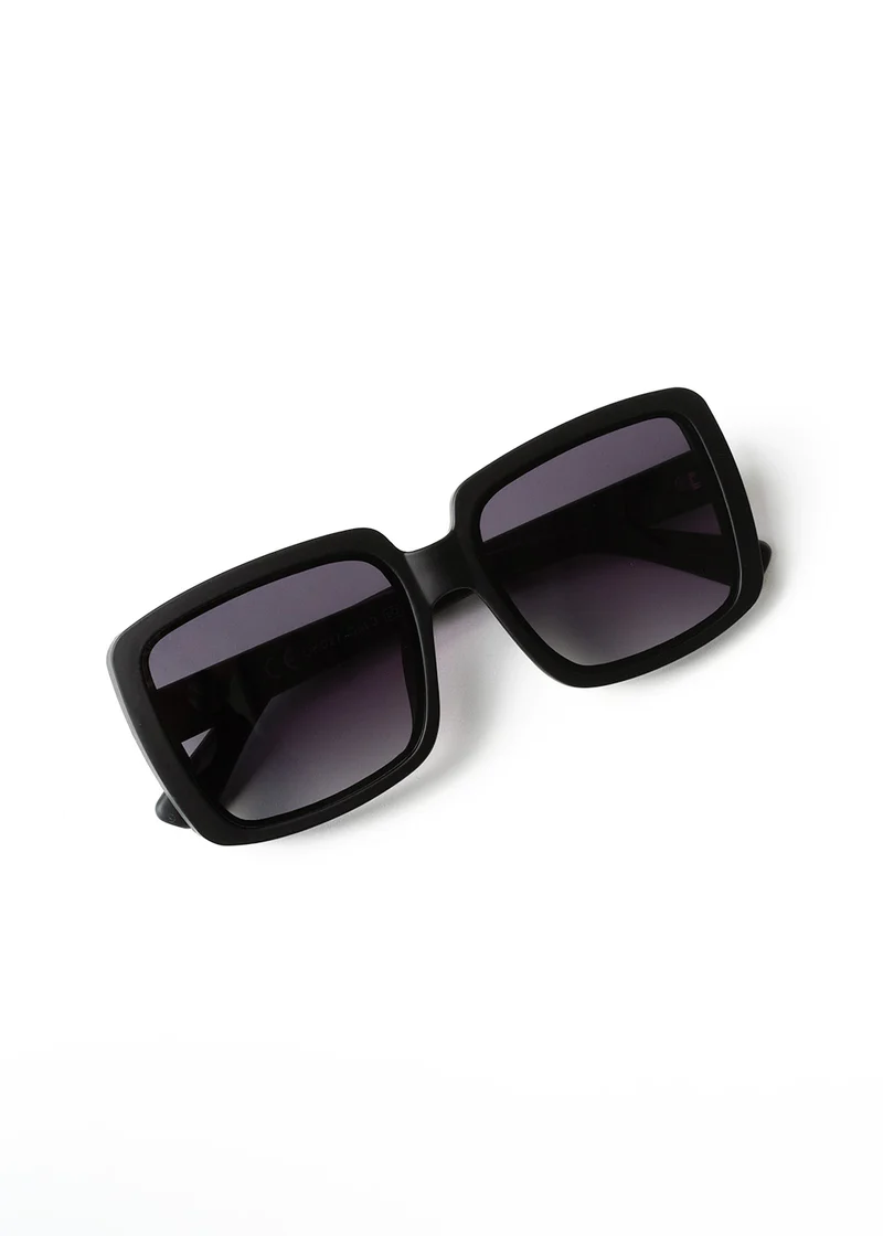 A pair of black oversized sunglasses