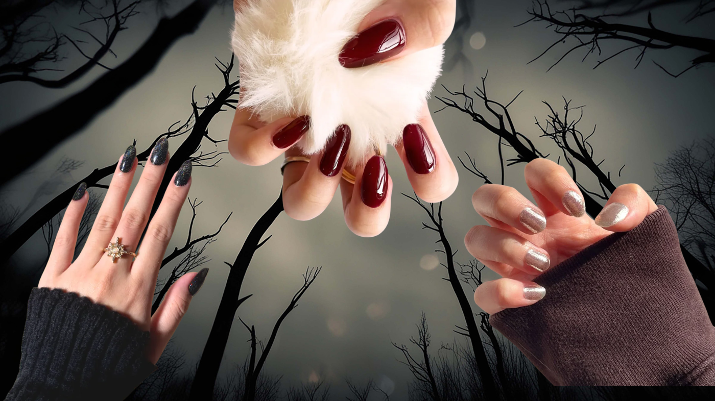 Skeleton-inspired manicure using EyeCandys Meow Me Back, Wine Not, and All That Glitters gel nail stickers for a macabre cosplay look