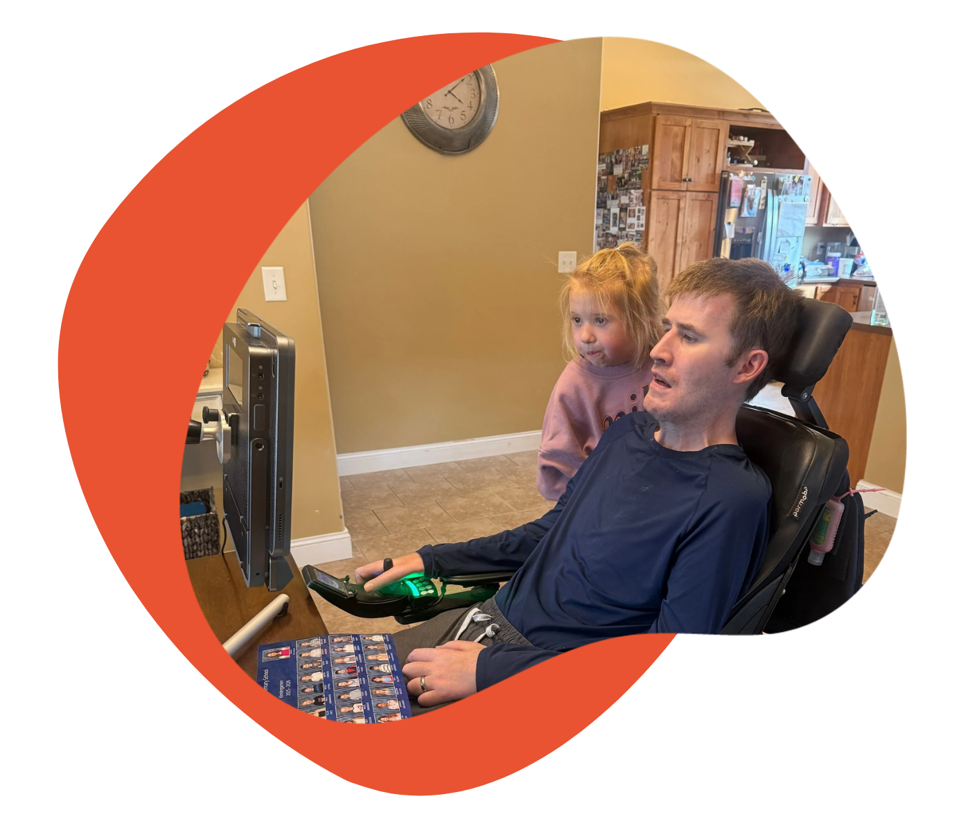 A boy in a wheelchair is interacting with a girl.