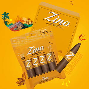 A Zino Nicaragua Short Torpedo cigar floating in front of four Short Torpedos in a freshpack and a wooden box.