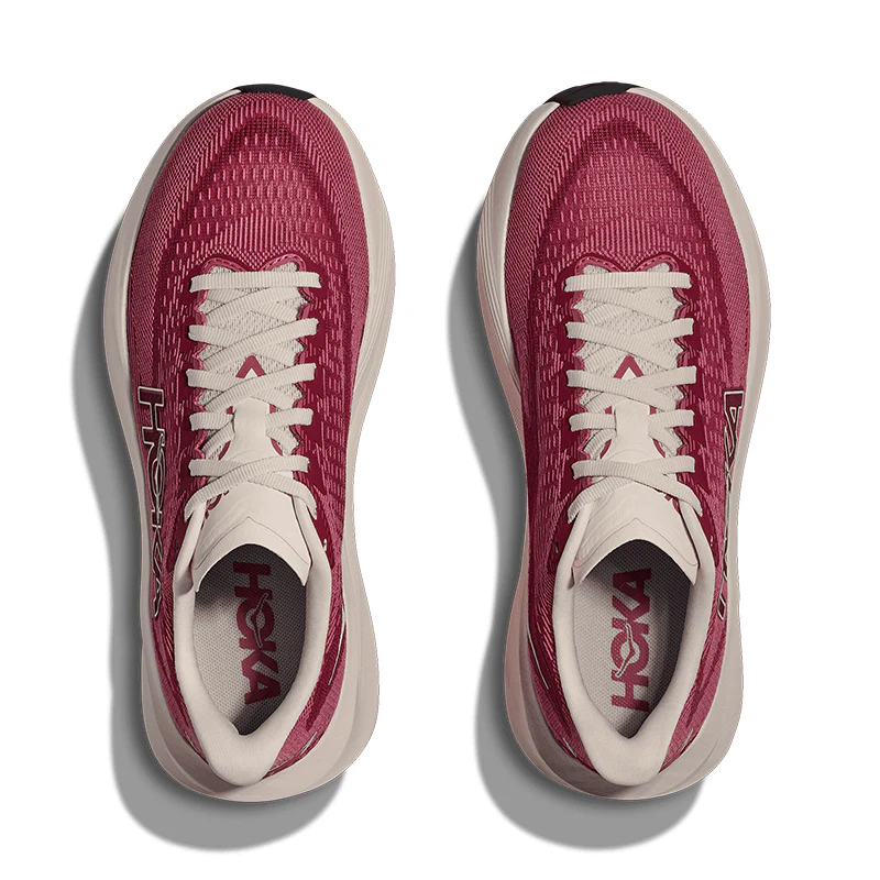 Two pairs of red and white athletic shoes.